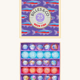 Billes & Co marbles in a neon fish inspired design. Features 25 pearlescent marbles with a mixture of glow in the dark glass marbles and a box with neon fish