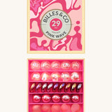 Billes & Co marbles in a pink wave inspired design. Features 29 pink glass marbles with a mixture of textured and flat marbles. Comes in a matching decorative box. 
