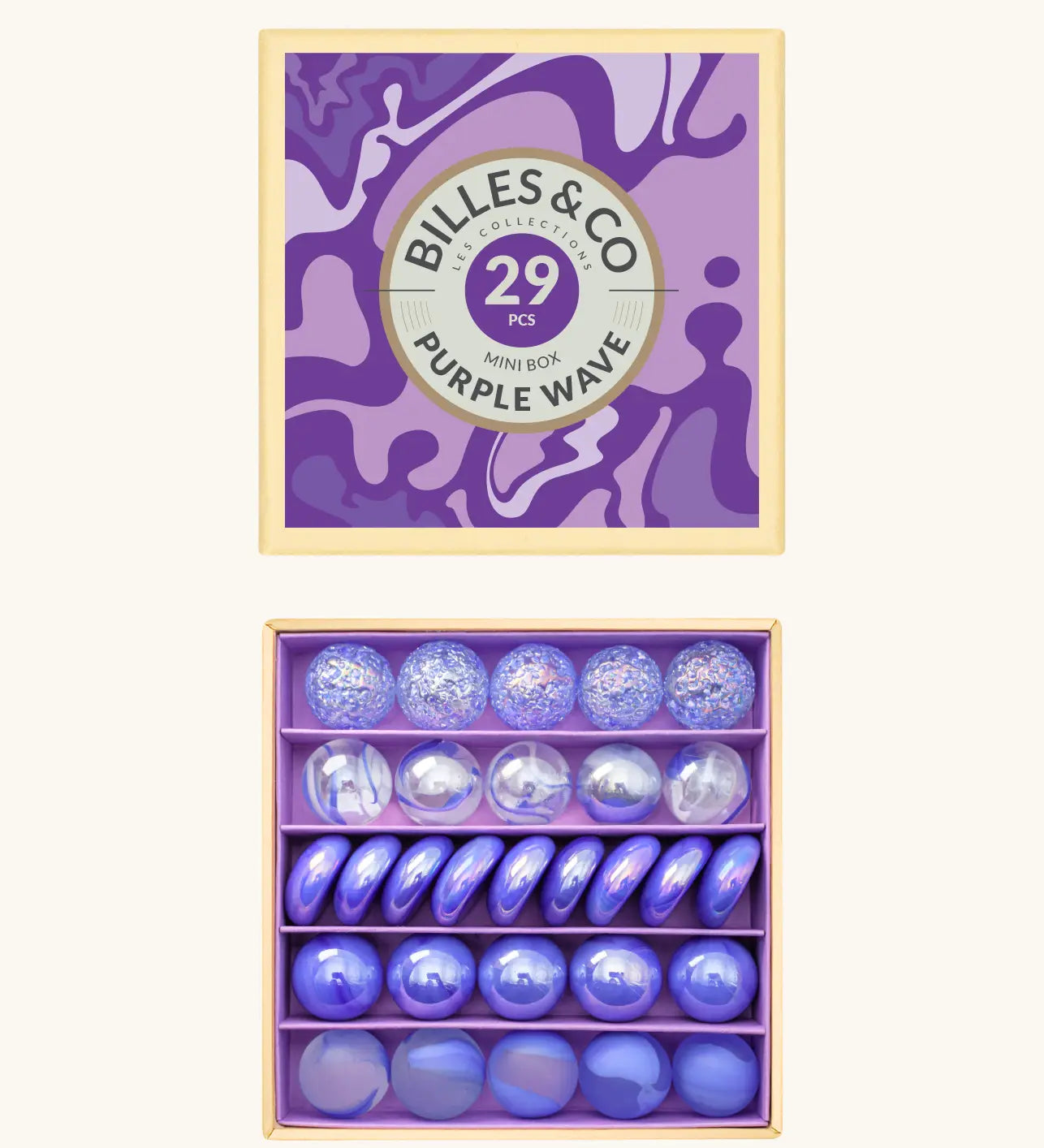 Billes & Co marbles in a purple wave inspired design showing 29 glass marbles and comes in a matching decorative box. 