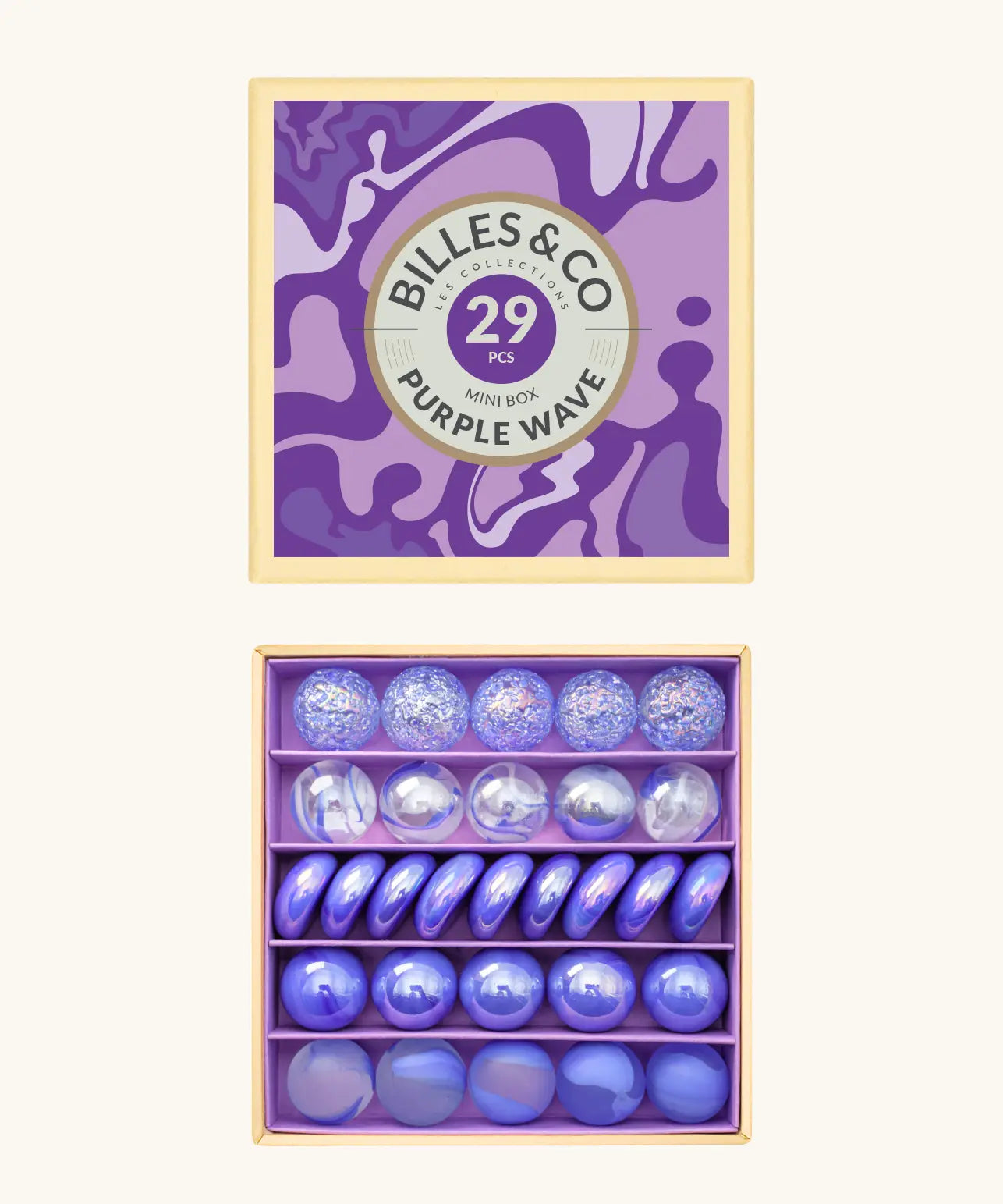 Billes & Co marbles in a purple wave inspired design showing 29 glass marbles and comes in a matching decorative box. 