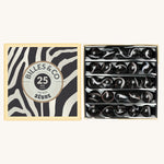Billes & Co Zebra Glass Marbles Set box, with white and black striped marbles in a white and black Zebra stripe box, on a cream background