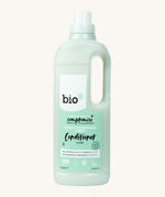 A 1L bottle of Bio-D fresh juniper fabric conditioner available at Babipur. Features a cap for easy pouring and a handle for carrying.