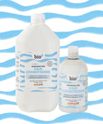 Bio-D Fragrance-Free Hair Conditioner shown in 500ml reusable bottle and 5 litre refill size, refillable hair care for sensitive scalps and family bathrooms.