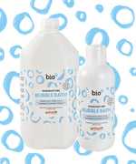 Bio-D Fragrance-Free Bubble Bath shown with a 5 litre refill bottle and a 1 litre bottle side by side on a bubbly background.