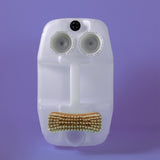 A reused Bio-D 5 litre washing up liquid container with upcycled lids and a dish brush arranged as a playful face, highlighting the brand’s refill and reuse ethos promoted by Babipur.