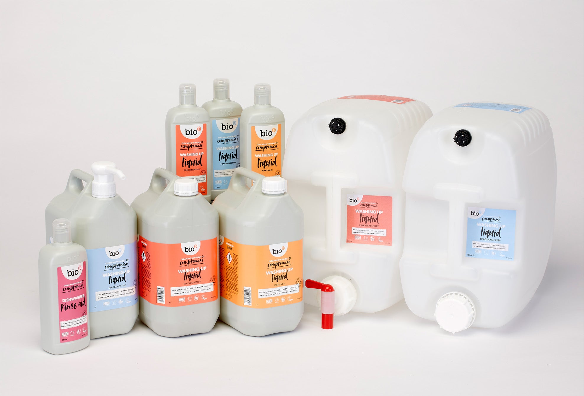 A full range of Bio-D washing up liquid bottles and bulk refills, including 20 litre closed loop containers, displayed together to show fragrance options and refill sizes available at Babipur.