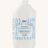 Front view of Bio-D Fragrance-Free Shampoo 5 litre refill bottle with white cap and blue wave label, showing Allergy UK approval.