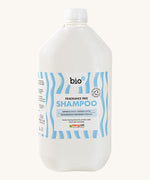 Front view of Bio-D Fragrance-Free Shampoo 5 litre refill bottle with white cap and blue wave label, showing Allergy UK approval.