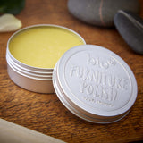 An open tin of Bio-D 100% natural furniture polish available at Babipur. showing the consistency of the polish