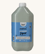 A 5L bottle of Bio-D fragrance free laundry liquid available at Babipur.. Features a cap for easy pouring.