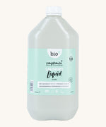 A 5L bottle of Bio-D juniper laundry liquid available at Babipur.. Features a cap for easy pouring.