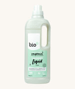 A 1L bottle of Bio-D juniper non bio laundry liquid available at Babipur.. Features a cap for easy pouring and a handle for carrying.