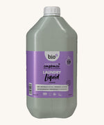 A 5L bottle of Bio-D lavender laundry liquid available at Babipur.. Features a cap for easy pouring.