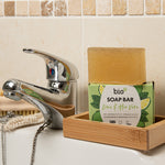 Bio-D natural Vegan aloe vera and lime soap bar next to a bathroom sink