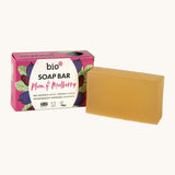 An open Bio-D plum & mulberry soap box standing next to the soap bar available at Babipur. 