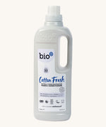 A 1L bottle of Bio-D cotton fresh fabric conditioner. Features a cap for easy pouring and a handle for carrying.