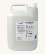 A side view of the 5L bottle of Bio-D cotton fresh non bio laundry liquid. Features a cap for easy pouring and a handle for carrying.