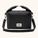 Black+Blum 10 litres insulated and water repellent roll top lunch bag in black with a hook buckle fastener and carry strap