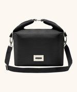 Black+Blum 10 litres insulated and water repellent roll top lunch bag in black with a hook buckle fastener and carry strap
