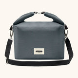 Black+Blum 10 litres insulated and water repellent roll top lunch bag in slate blue with a hook buckle fastener and carry strap