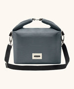 Black+Blum 10 litres insulated and water repellent roll top lunch bag in slate blue with a hook buckle fastener and carry strap