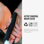 An info graphic featuring an image and text about the Black+Blum Active Charcoal Water Filter. The image shows the charcoal filters in a person's hands. The text reads, Active charcoal water filter. Submerge for 1-8 hours in a bottle or jug filled with safe drinking water. Along with the symbols for recyclable, 100% natural wood and food safe. 