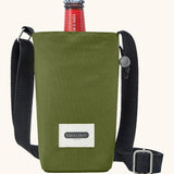 Black + Blum insulated water repellent bottle bag in moss green with the lid open showing a bottle of beer sitting inside 