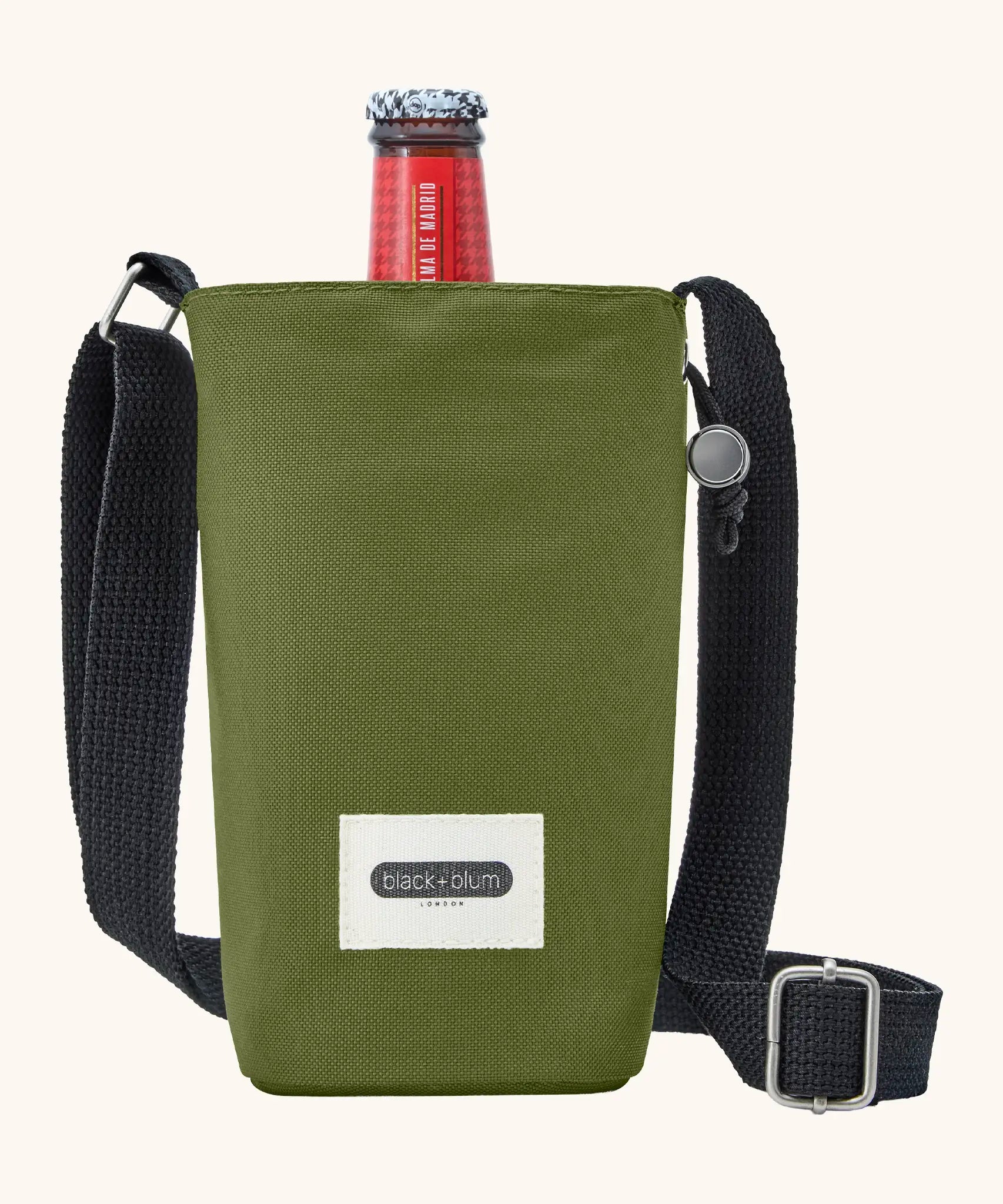Black + Blum insulated water repellent bottle bag in moss green with the lid open showing a bottle of beer sitting inside 