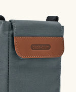 Black + Blum insulated bottle bag in slate blue showing a close up of the velcro flip lid