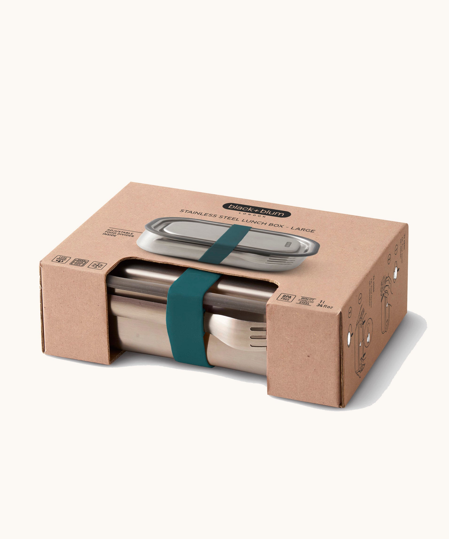 Black+Blum Large Leak Proof Stainless Steel Lunch Box with ocean coloured strap shown in it's cardboard packaging box. This lunchbox is part of a wide range of stainless steel lunch box options available here at Babipur. 