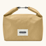 Black+Blum 7 litres insulated and water repellent roll top lunch bag in clay beige with a hook buckle fastener