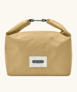 Black+Blum 7 litres insulated and water repellent roll top lunch bag in clay beige with a hook buckle fastener