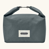 Black+Blum 7 litres insulated and water repellent roll top lunch bag in slate blue with a hook buckle fastener