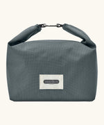 Black+Blum 7 litres insulated and water repellent roll top lunch bag in slate blue with a hook buckle fastener