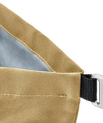 A clai beige Black+Blum 7 litres insulated roll top lunch bag showing a water repellent lining