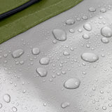The water repellent lining on the moss green Black+Blum lunch bag showing trickling water