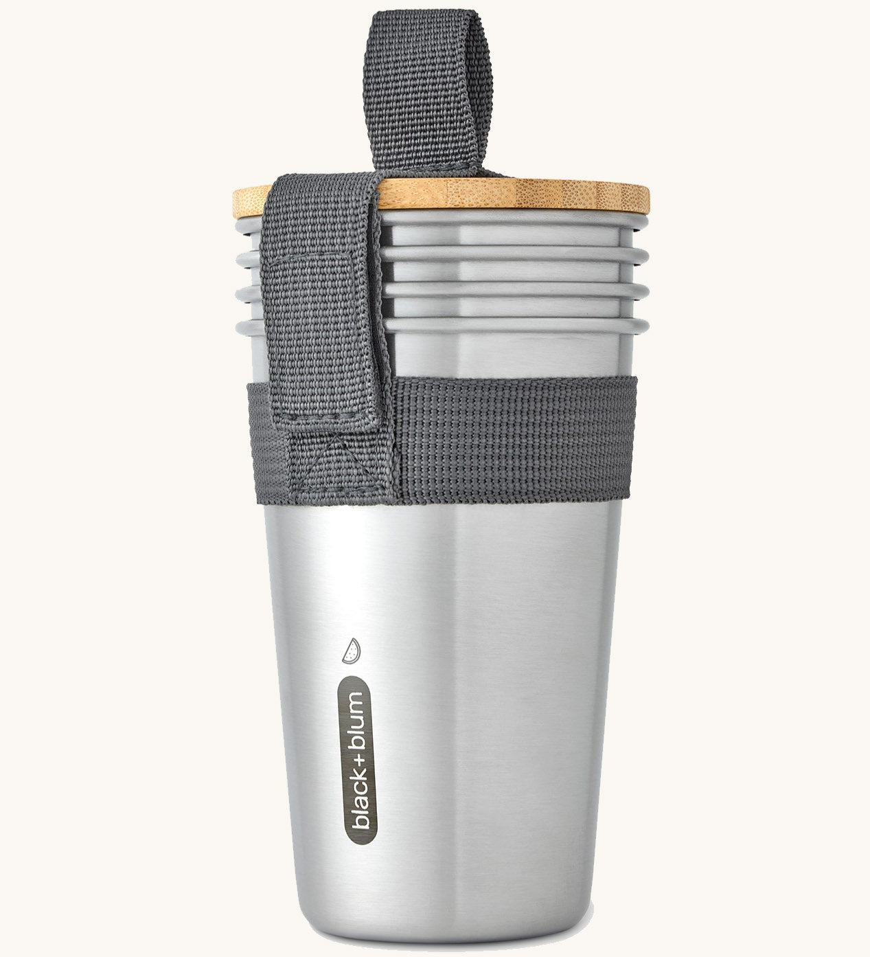 A set of 4 Black + Blum stainless steel cups available at Babipur. Features a handy black carry strap and a protective Bamboo lid which can be used as a bottle opener 