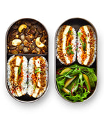 Two open Black+Blum 500ml stainless steel leakproof lunchboxes showing fresh food inside both