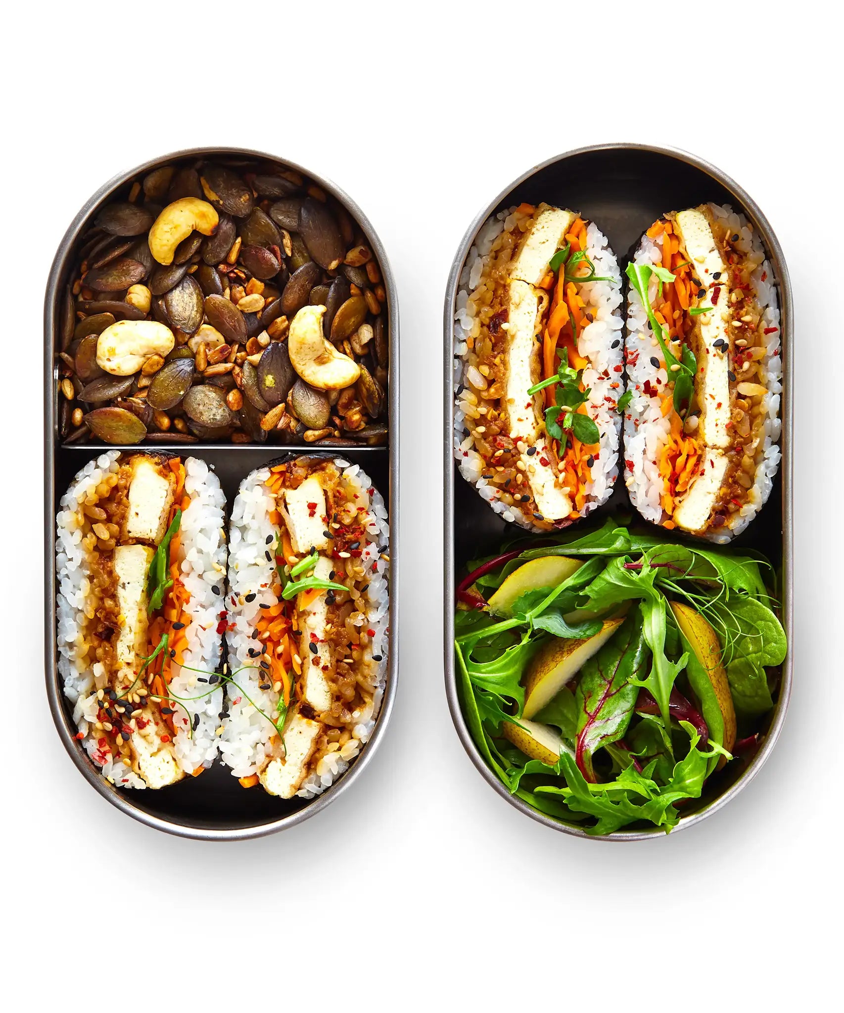 Two open Black+Blum 500ml stainless steel leakproof lunchboxes showing fresh food inside both