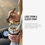 An image along side text. A close up of an open Black + Blum insulated stainless steel food flask with food inside. The text reads, ladle spoon and elastic strap. The ergonomic spoon fits snugly against the body of the flask, secured by an elastic and machine-washable strap. 