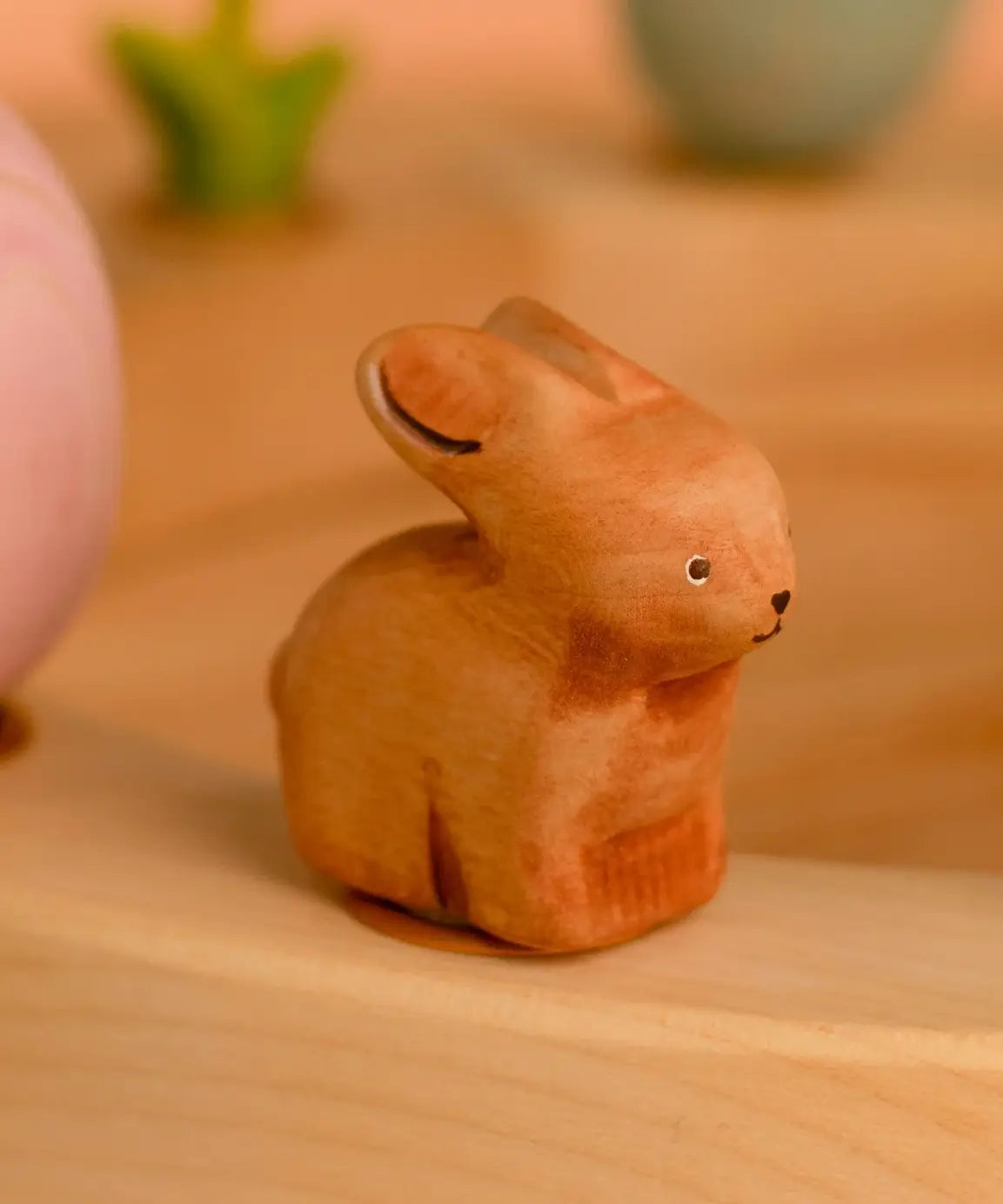 Bumbu wooden brown bunny decorative figure standing in a celebration ring