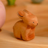 Bumbu wooden brown bunny decorative figure standing in a celebration ring