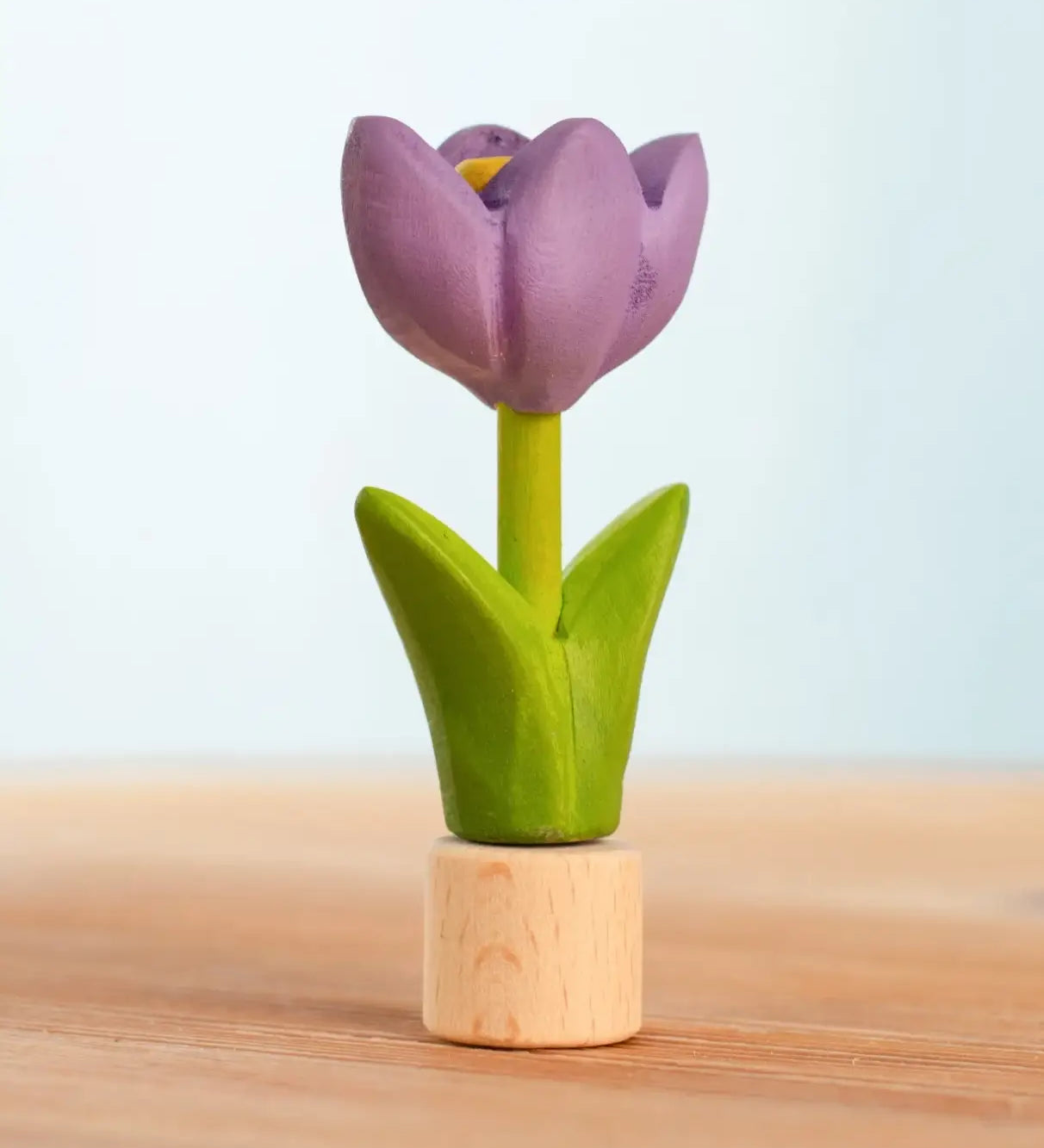 Bumbu handcrafted wooden purple festive crocus figure standing on wooden base for Grimms celebration ring