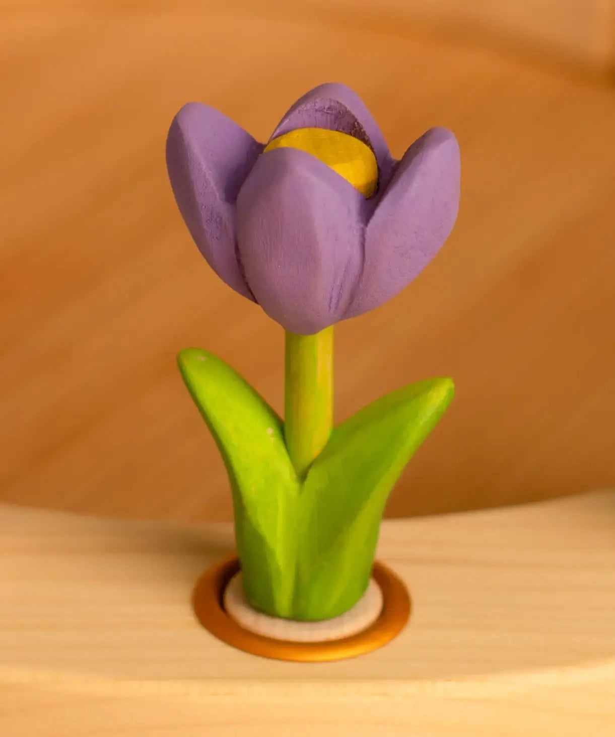 Bumbu wooden purple crocus decorative figure standing in a celebration ring