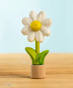 Bumbu handcrafted wooden festive daisy figure standing on wooden base for Grimms celebration ring
