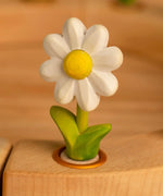 Bumbu wooden daisy decorative figure standing in a celebration ring