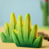 Bumbu Toys dessert bush for small world play placed at the front of a small world play scene.
