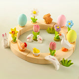 A Easter inspired celebration ring showing different wooden decorative figures including eggs, rabbits and flowers