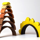 Bumbu solid wooden stacking sunflower arches stacked in a tower on a white background