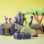 A play scene featuring a family of Bumbu wooden emu's 